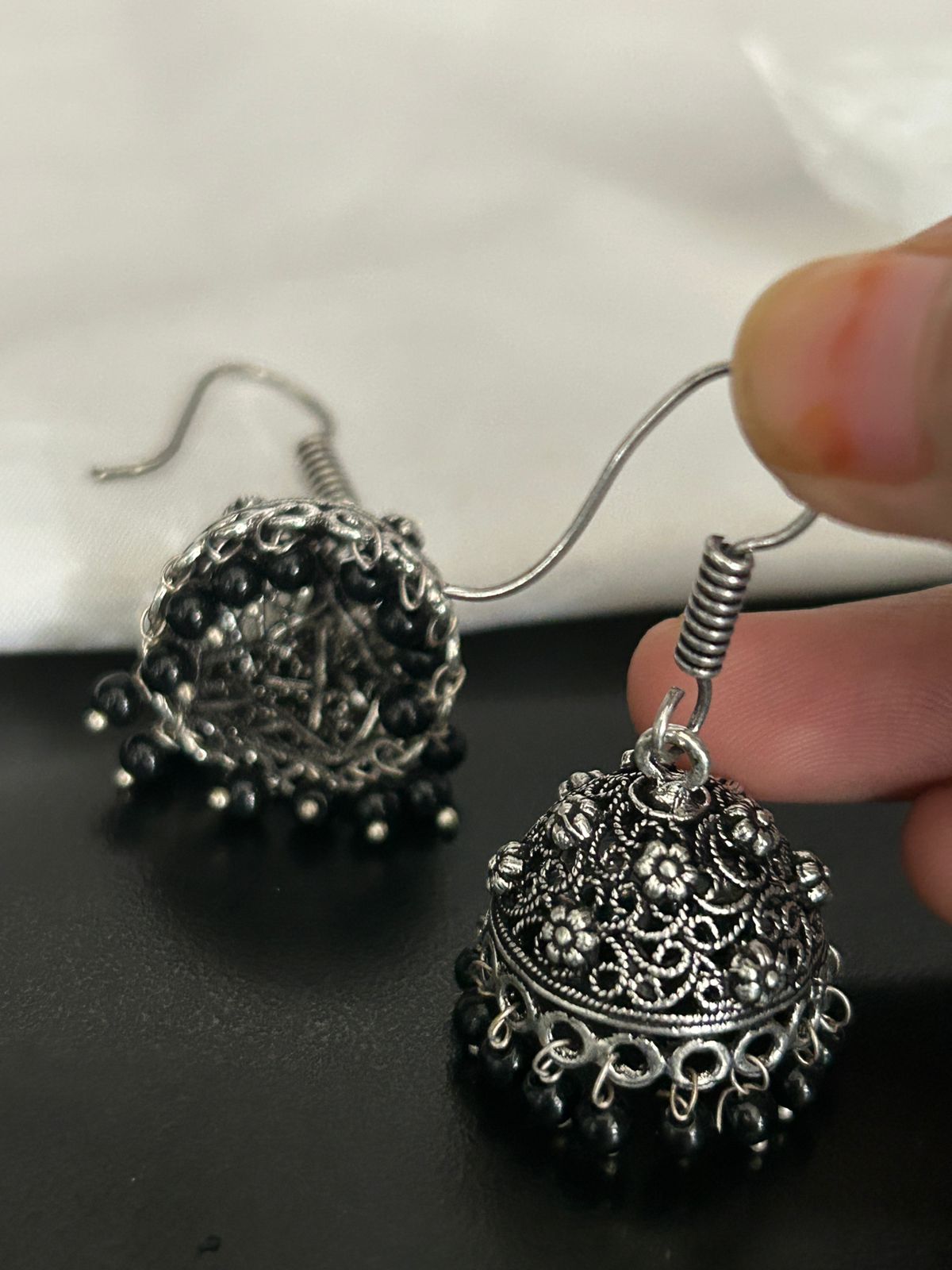 Oxidized Silver Floral Jhumka Earrings with Black Beads